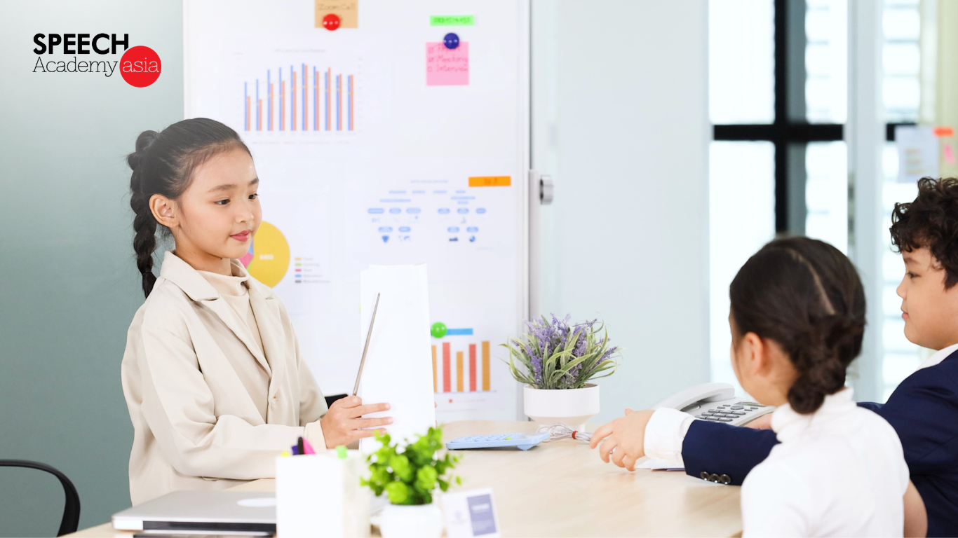 Student confidently presenting during a presentation skills workshop in Singapore