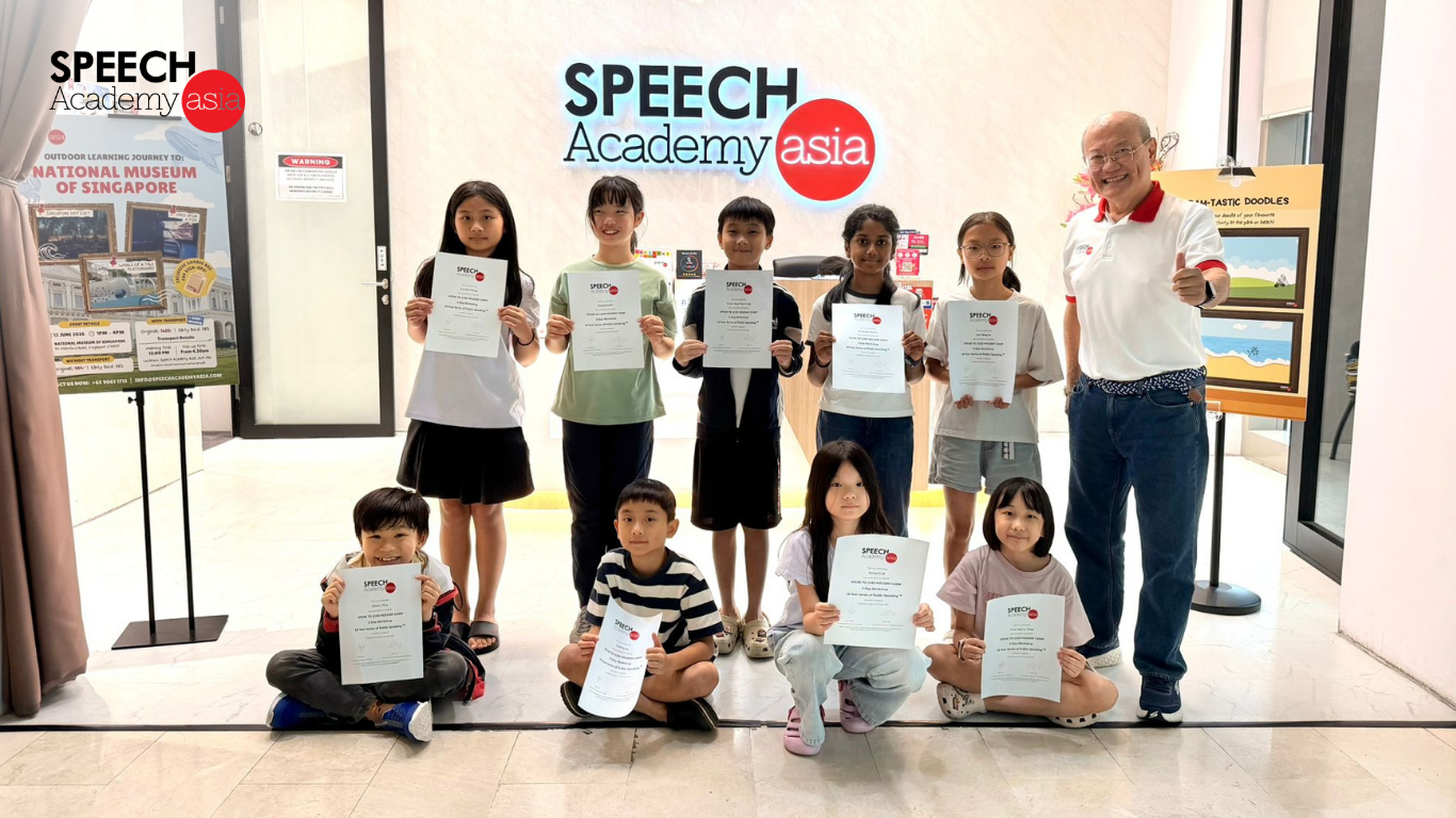 Speech Academy Asia students proudly holding their DSA certificates after completing their coaching programme.