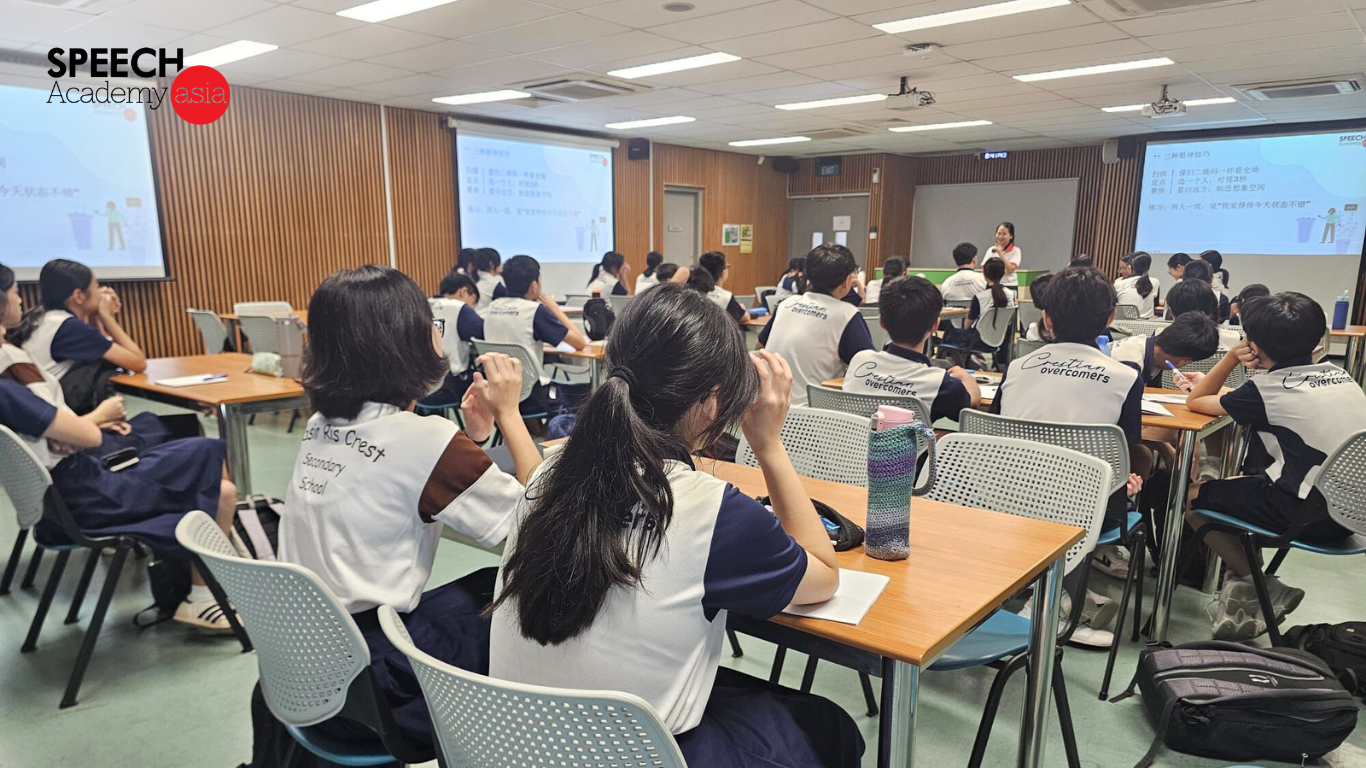 Secondary school students practising presentation skills in a public speaking class