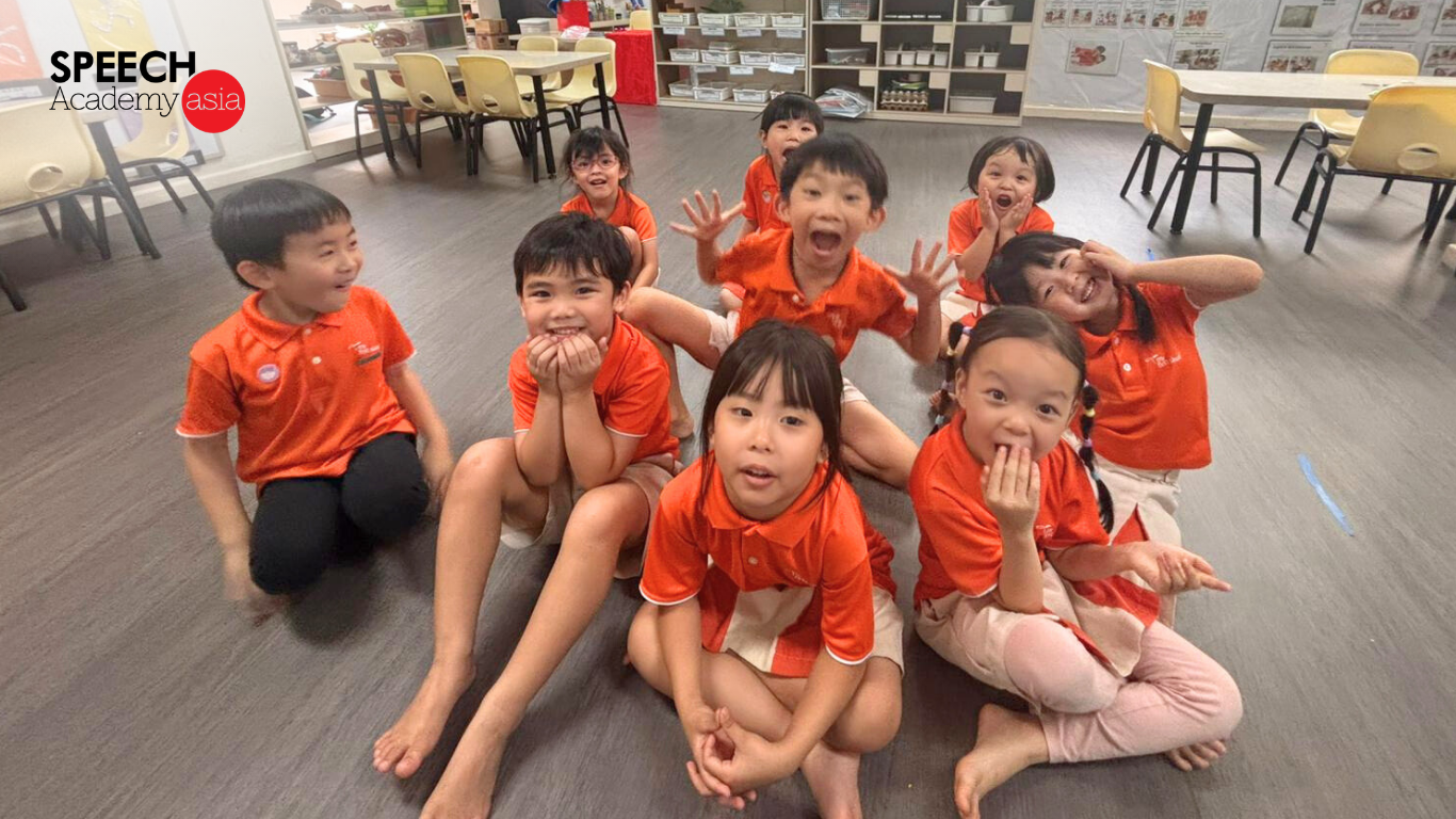 Preschool children building confidence through speaking activities in a public speaking class in Singapore
