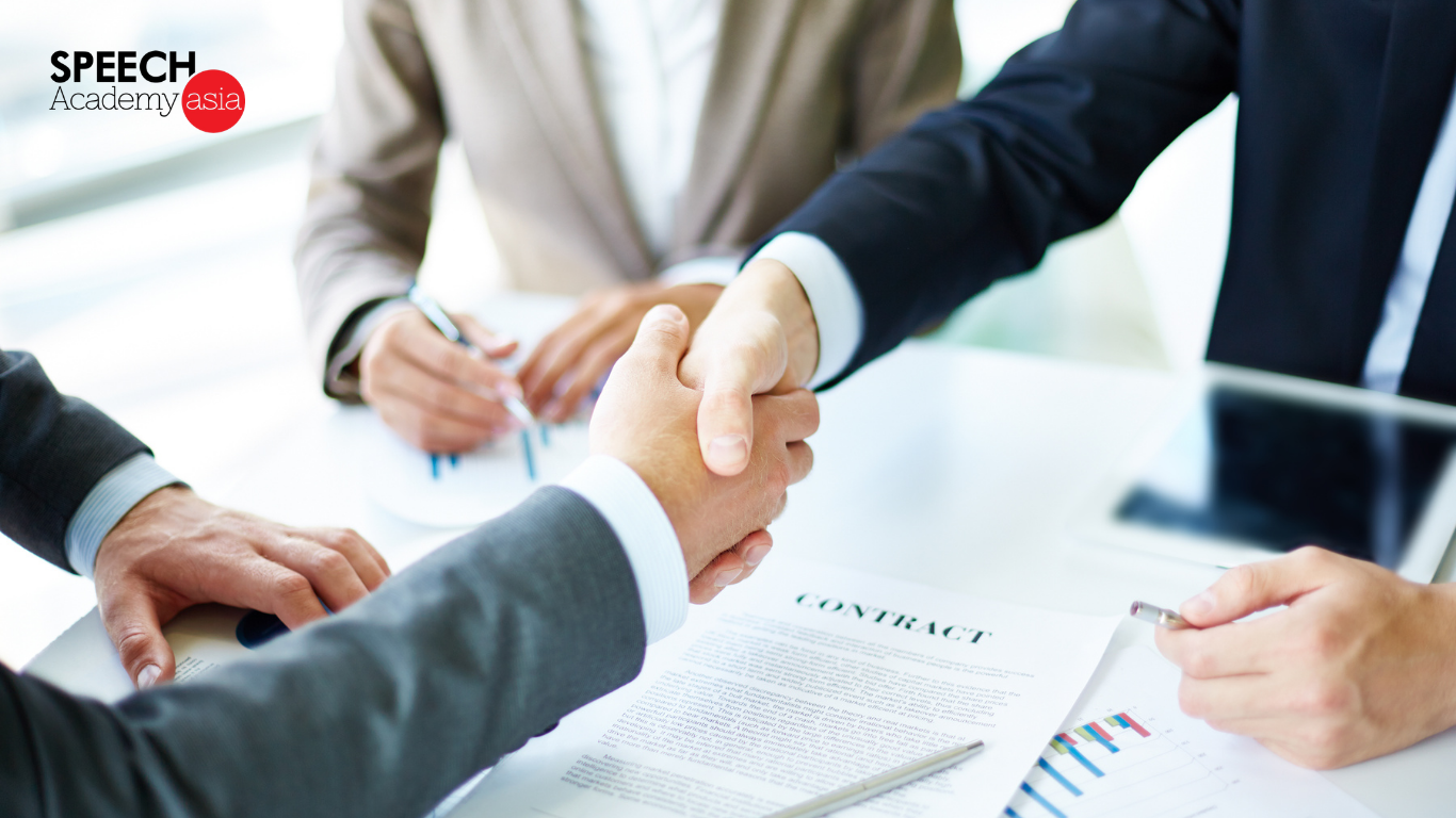 Education franchise business partnership handshake