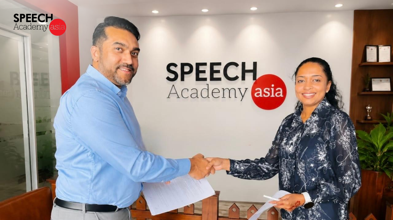 Speech Academy Asia General Manager Zainuddin shaking hands with the new Sri Lanka franchise partner